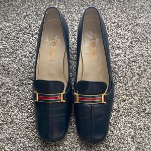 Vintage Gucci Loafers with black heel and signature stripe buckle